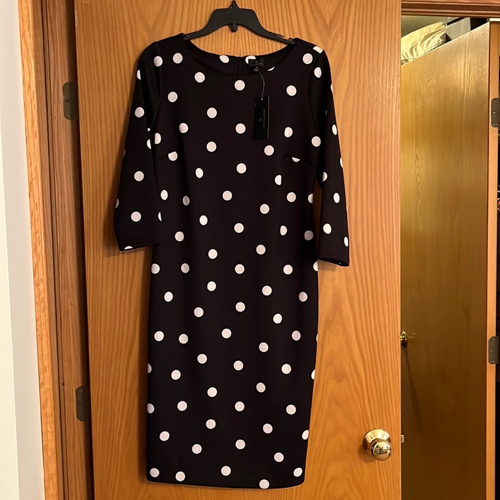 Ladies new with tags black with white polka dots dress.
